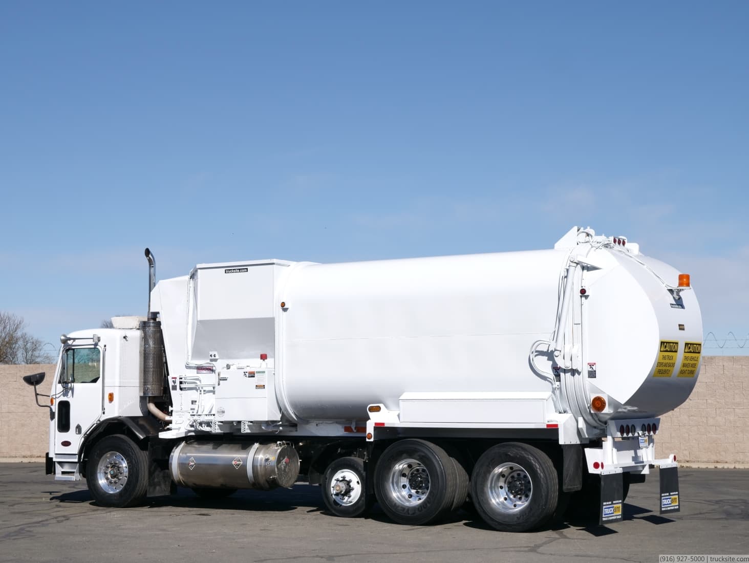 2009 Peterbilt Amrep LNG 36 Yard Auto Side Loader