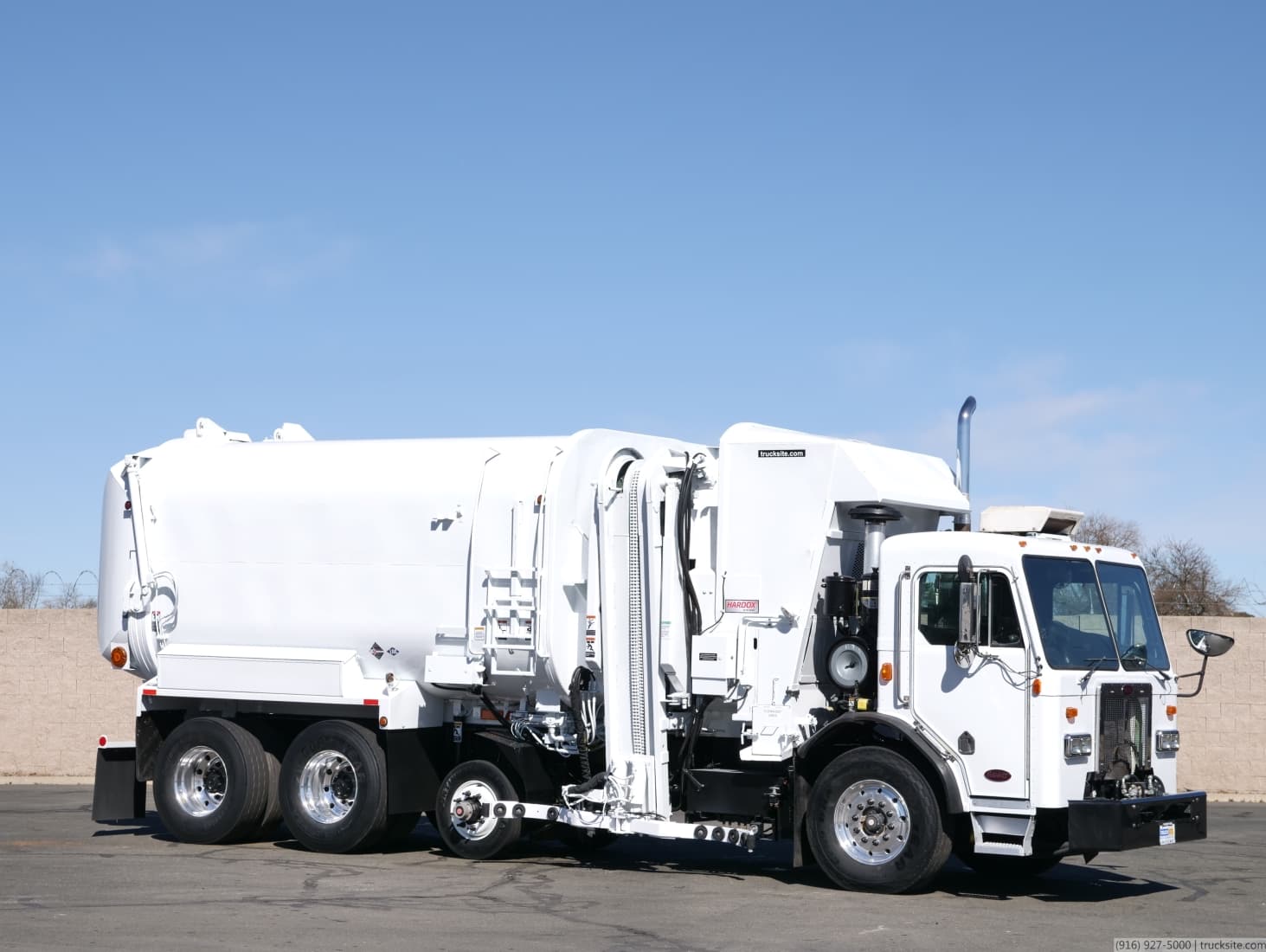 2009 Peterbilt Amrep LNG 36 Yard Auto Side Loader