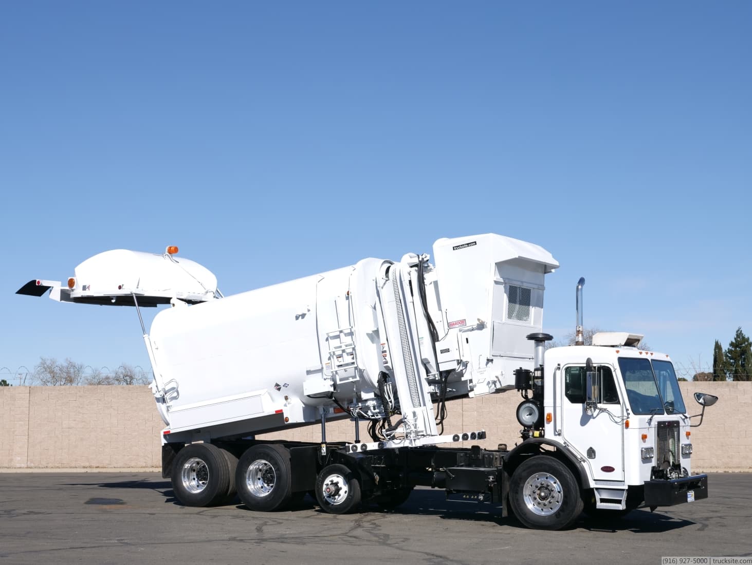 2009 Peterbilt Amrep LNG 36 Yard Auto Side Loader
