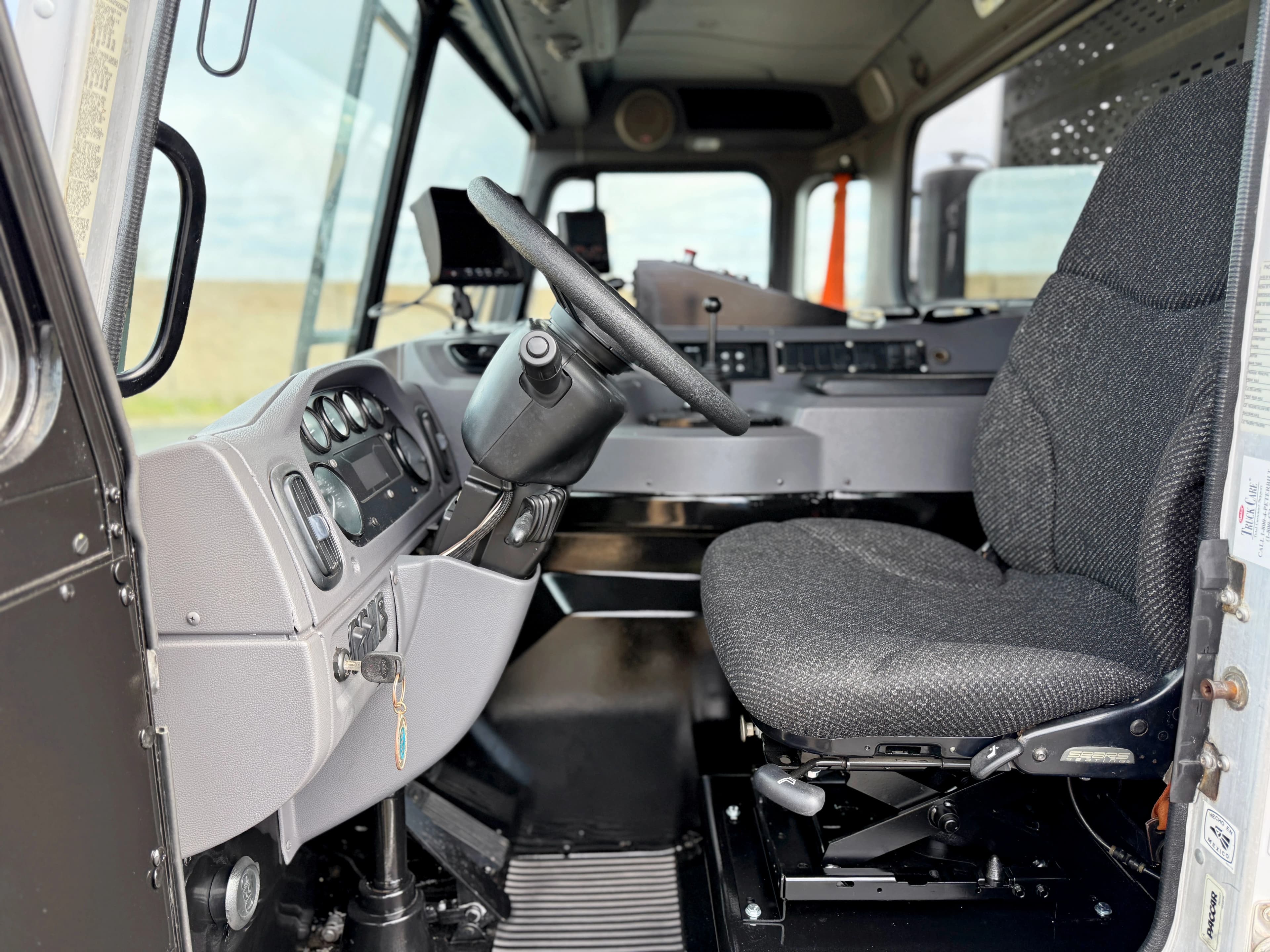 2016 Peterbilt 320 Heil Half/Pack 40 Yard Front Load Garbage Truck